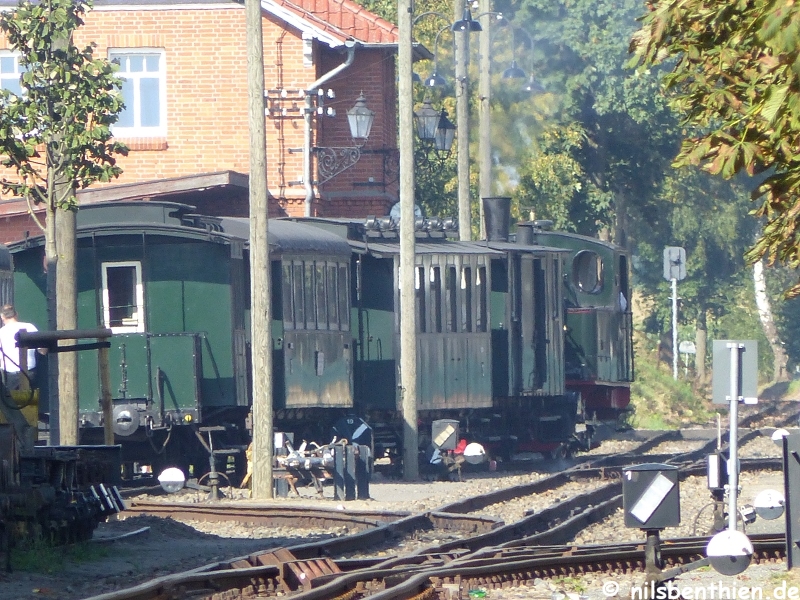 160037